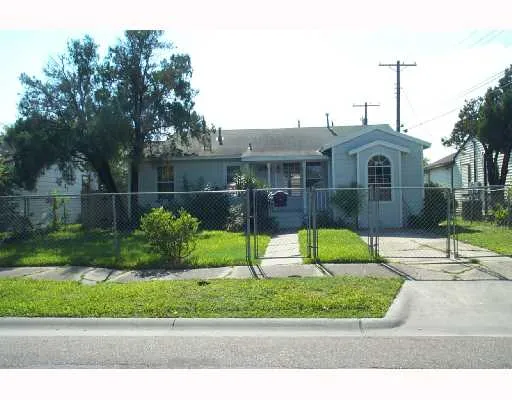 a house view with a garden space