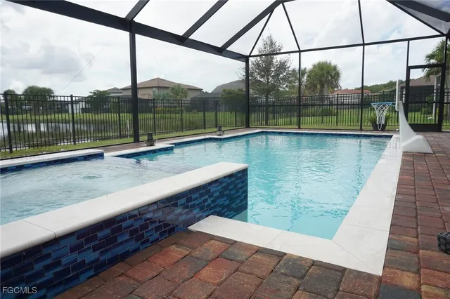 a dining space with furniture and outdoor view