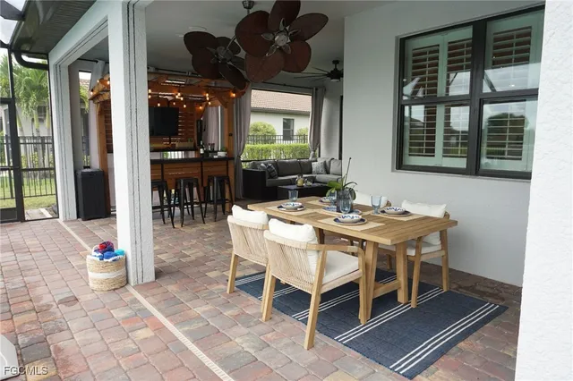 a room with wooden floor and furniture
