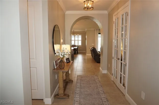 a view of a hallway with bathroom