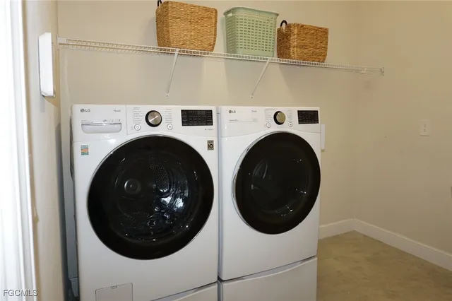a view of a lake with a house in the background