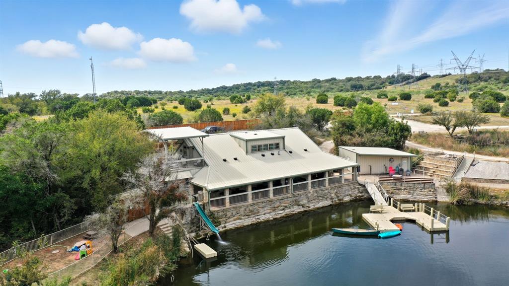 4636 Halsell Ranch Road Jacksboro, TX 76458 - Photo 16 of 40 a view of a lake with a city from a balcony