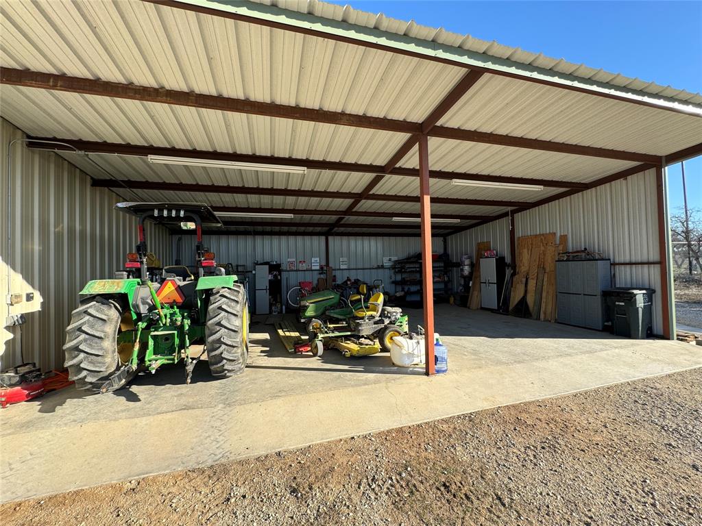 4636 Halsell Ranch Road Jacksboro, TX 76458 - Photo 39 of 40 a view of a room with gym equipment