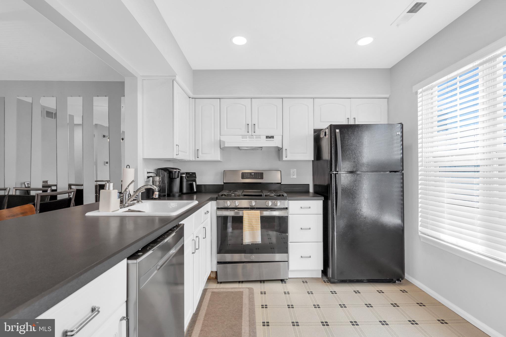 1508 B Ralston Drive Mount Laurel, NJ 08054 - Photo 16 of 29 a kitchen with a stove a refrigerator and a sink