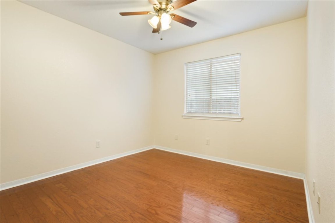 314 Katy Crossing Georgetown, TX 78626 - Photo 29 of 38 an empty room with a window and a fan