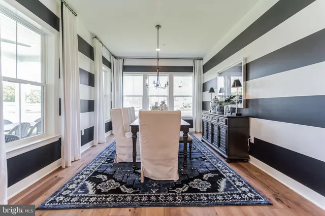 a living room with a couch and a table