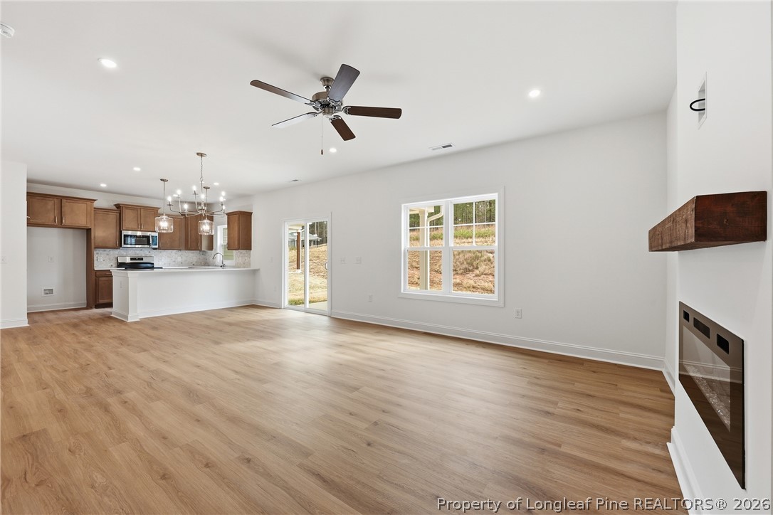 154 Carver Street Carthage, NC 28327 - Photo 11 of 41 a view of a kitchen with a sink and a refrigerator