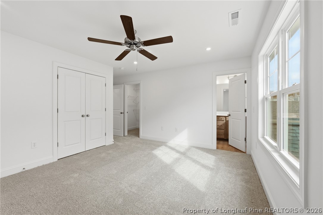 154 Carver Street Carthage, NC 28327 - Photo 20 of 41 a view of a livingroom with a ceiling fan and window