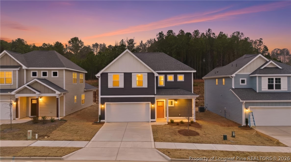 154 Carver Street Carthage, NC 28327 - Photo 2 of 41 a front view of a house with a yard
