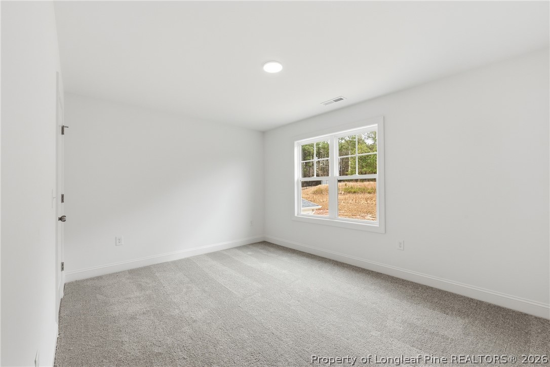 154 Carver Street Carthage, NC 28327 - Photo 28 of 41 an empty room with a window