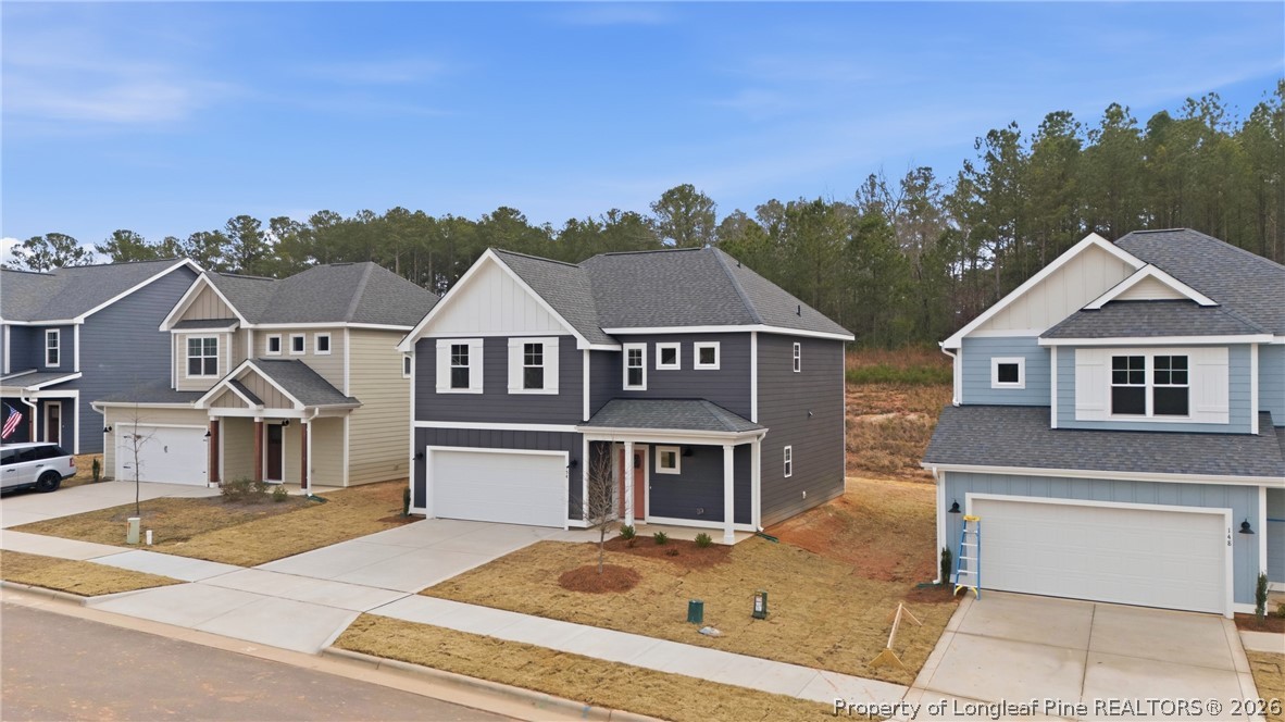 154 Carver Street Carthage, NC 28327 - Photo 3 of 41 front view of a house with a yard