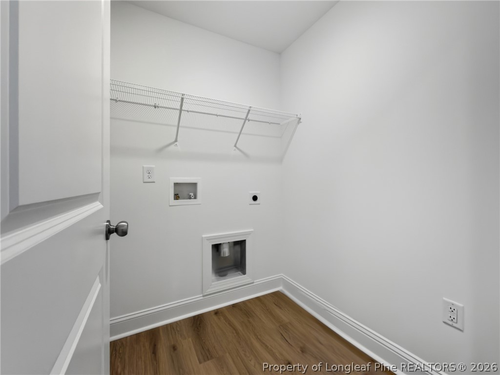 154 Carver Street Carthage, NC 28327 - Photo 31 of 41 a view of a hallway with wooden floor