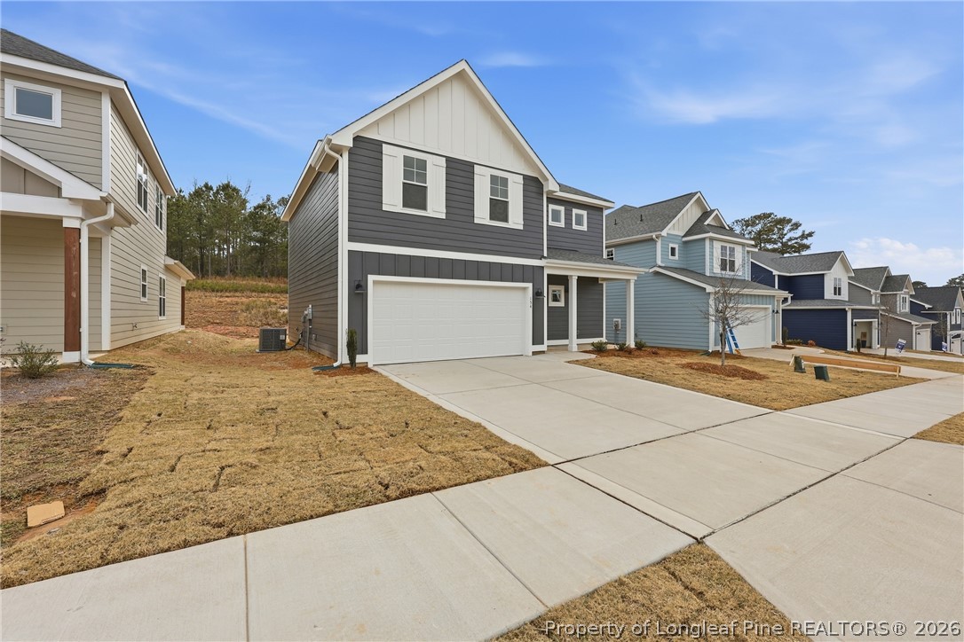 154 Carver Street Carthage, NC 28327 - Photo 38 of 41 a front view of a house with a yard