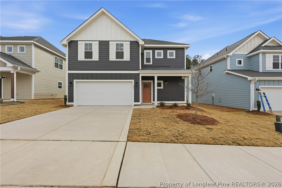 154 Carver Street Carthage, NC 28327 - Photo 39 of 41 a front view of a house with a yard