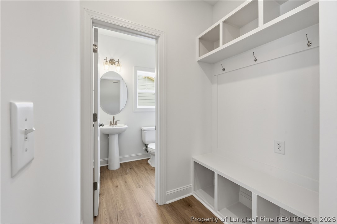 154 Carver Street Carthage, NC 28327 - Photo 7 of 41 a bathroom with a toilet and a sink