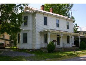 70 Grindstone Road Bridgewater, VA 22812 - Photo 1 of 1 a view of a yard in front of a white house