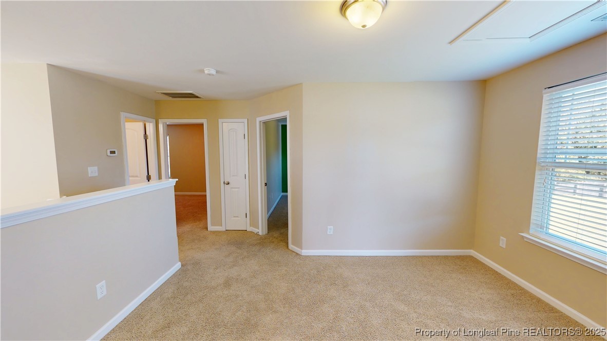 541 Roanoke Drive Raeford, NC 28376 - Photo 13 of 25 a view of an empty room with a window
