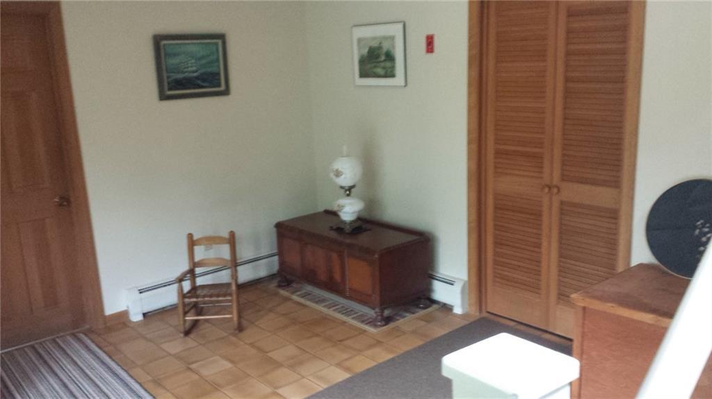 459 Buckfield Road Hebron, ME 04238 - Photo 6 of 32 Front foyer with entry for two of...