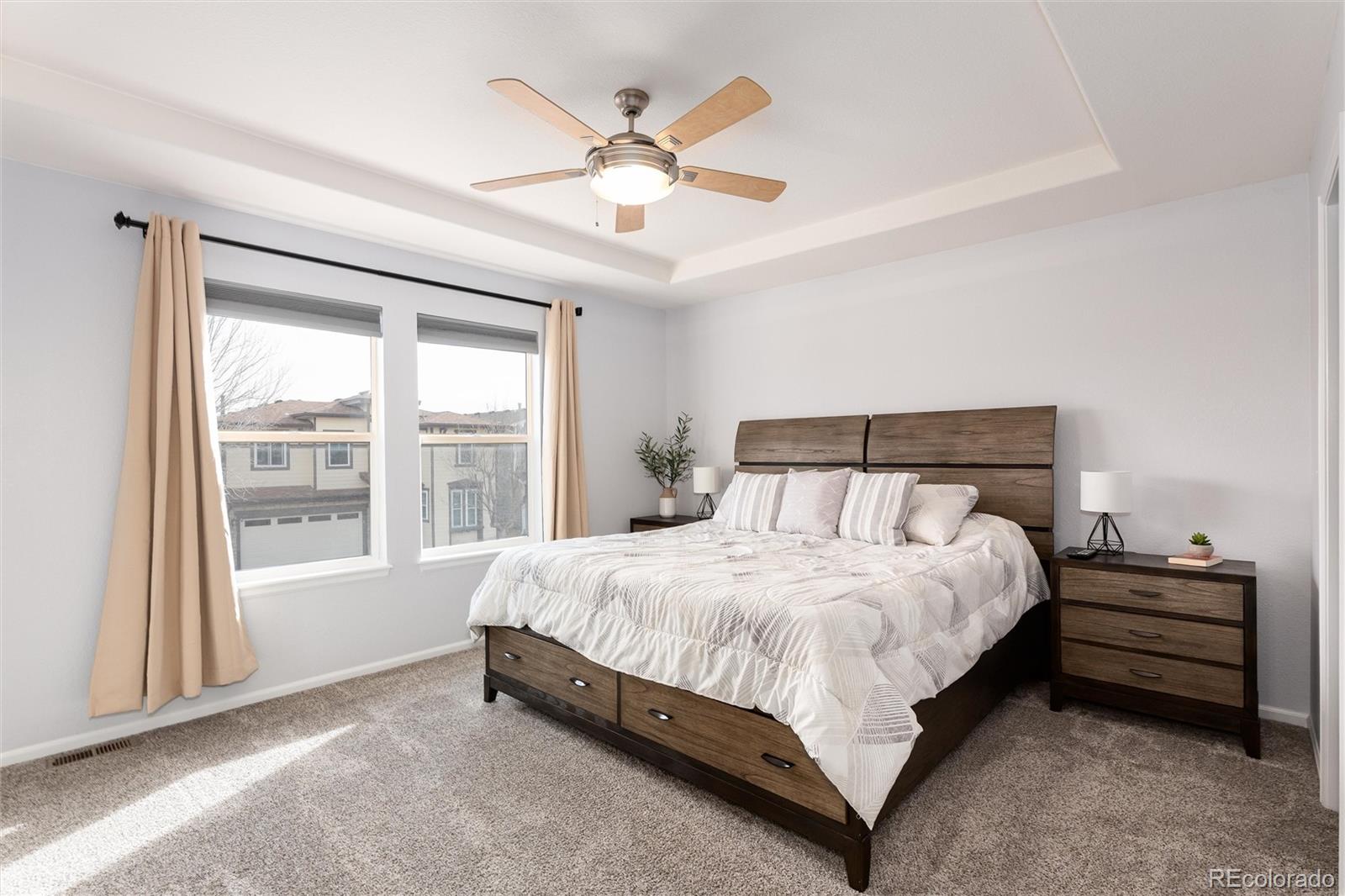 10627 Cherrybrook Circle Highlands Ranch, CO 80126 - Photo 27 of 44 a bedroom with a bed and window