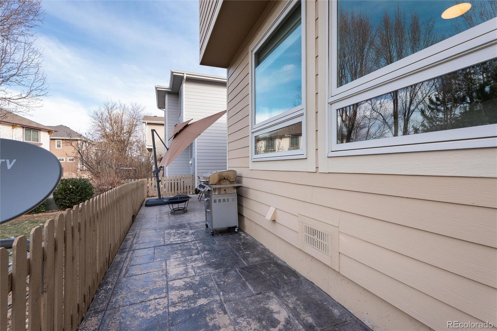 10627 Cherrybrook Circle Highlands Ranch, CO 80126 - Photo 39 of 44 a view of a house with a large window