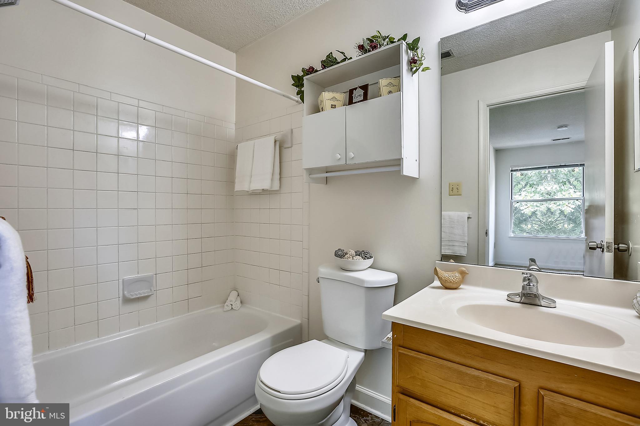 2600 Camelback Lane, Unit 10 Silver Spring, MD 20906 - Photo 21 of 39 Primary bathroom with tub/shower combo
