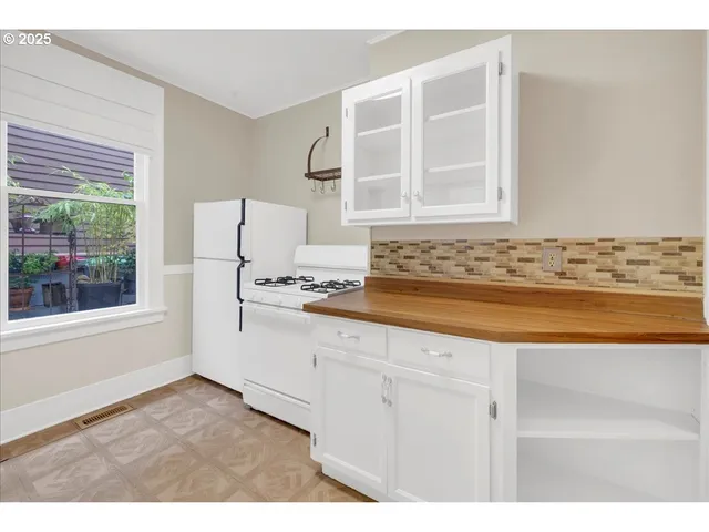 a bathroom with a sink and a window