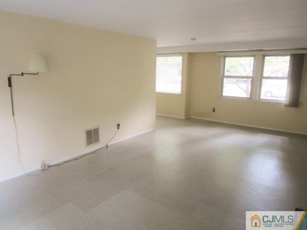 30 Hill Road Edison, NJ 08817 - Photo 3 of 17 an empty room with windows