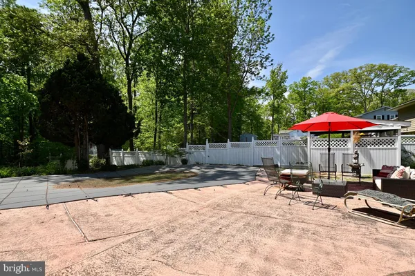 a view of a backyard of the house
