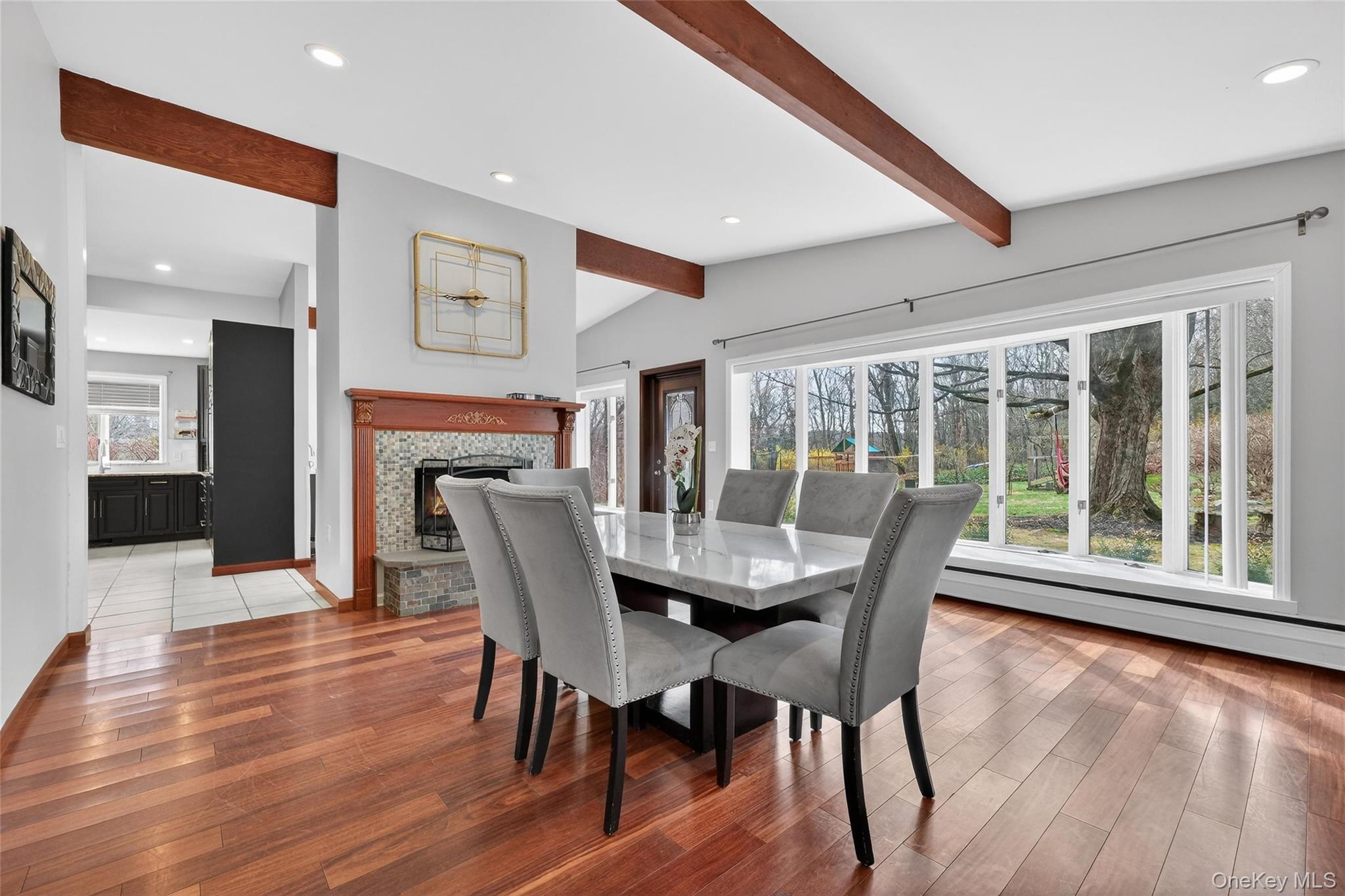 155 Roselawn Road Highland Mills, NY 10930 - Photo 13 of 40 a dining room with furniture window and wooden floor