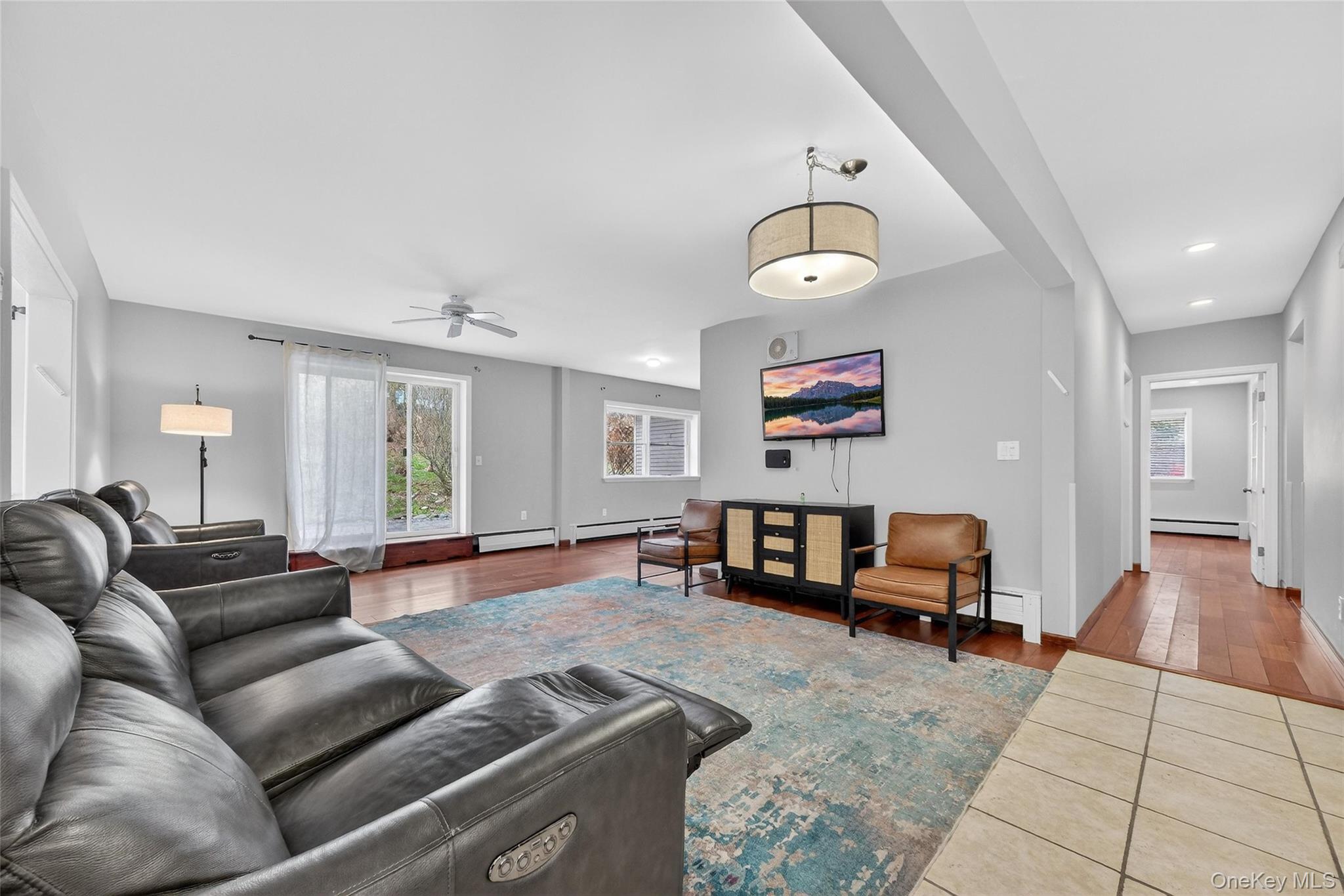 155 Roselawn Road Highland Mills, NY 10930 - Photo 15 of 40 a living room with furniture and wooden floor