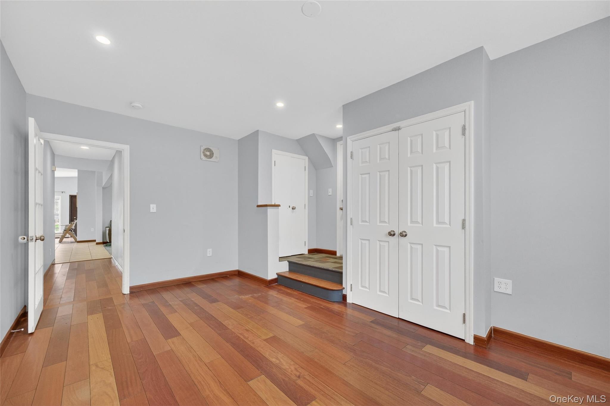 155 Roselawn Road Highland Mills, NY 10930 - Photo 17 of 40 a view of a hallway with wooden floor and closet