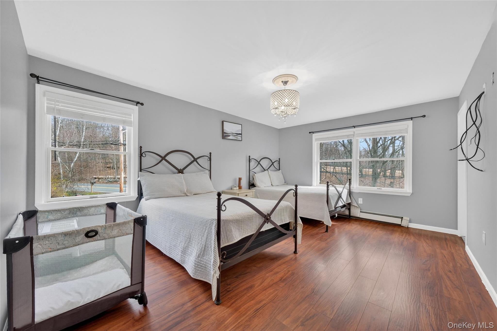 155 Roselawn Road Highland Mills, NY 10930 - Photo 23 of 40 a bedroom with a bed and a window