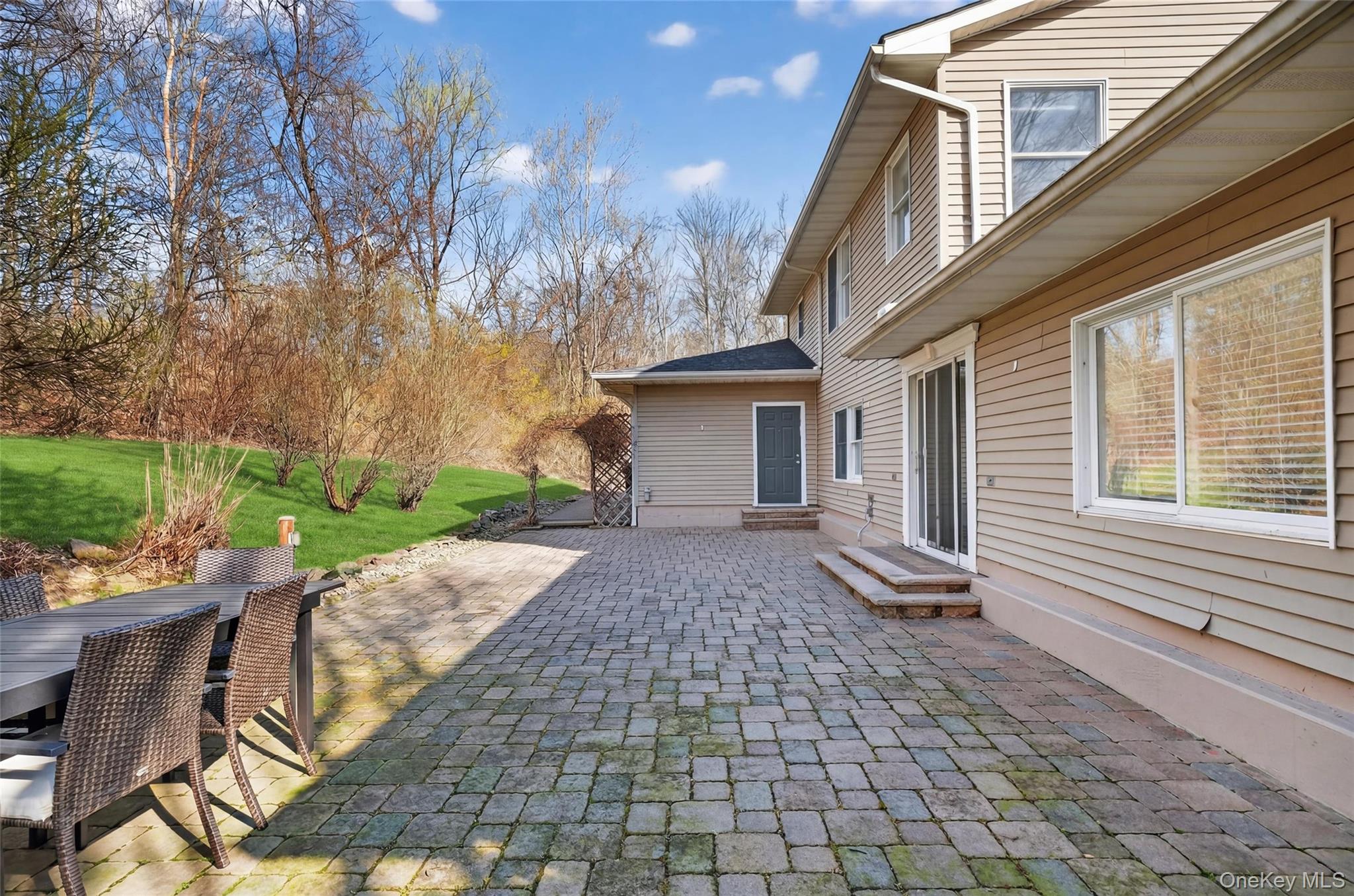 155 Roselawn Road Highland Mills, NY 10930 - Photo 31 of 40 a view of a house with backyard and sitting area