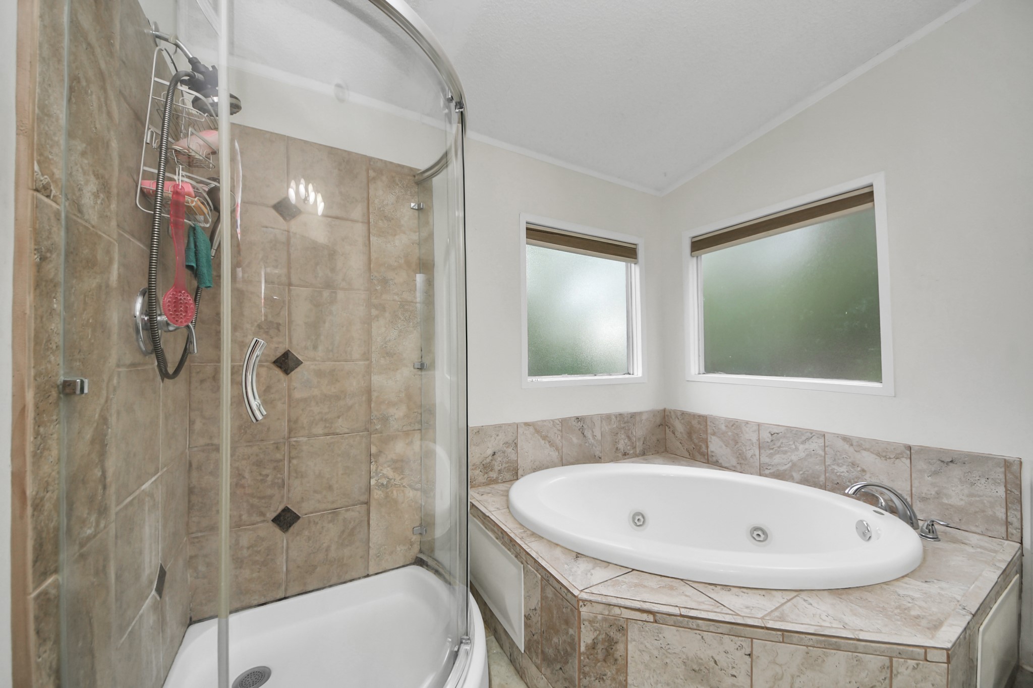 204 Edith Street Highlands, TX 77562 - Photo 12 of 33 a bathroom with a sink a toilet and shower