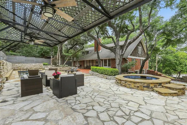 a view of a chairs and tables in the patio