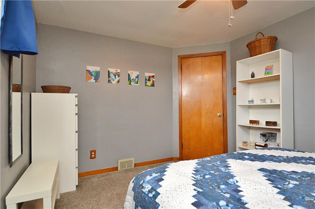 109 Thorncrest Drive McKees Rocks, PA 15136 - Photo 13 of 37 a bedroom with a bed and a lamp