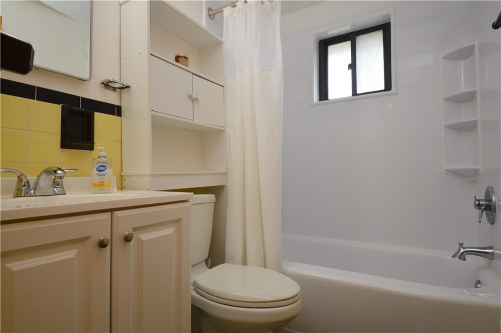 109 Thorncrest Drive McKees Rocks, PA 15136 - Photo 16 of 37 a bathroom with a granite countertop toilet sink and mirror