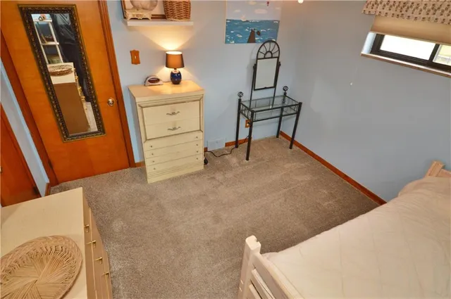 a workspace with furniture and window