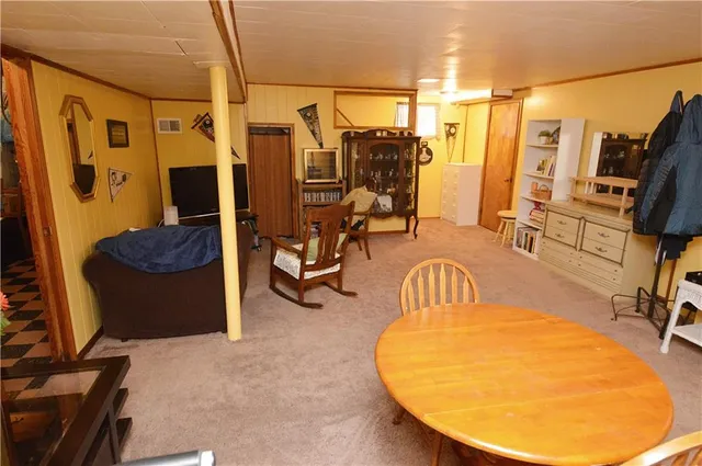 a view of a livingroom with furniture and a couch