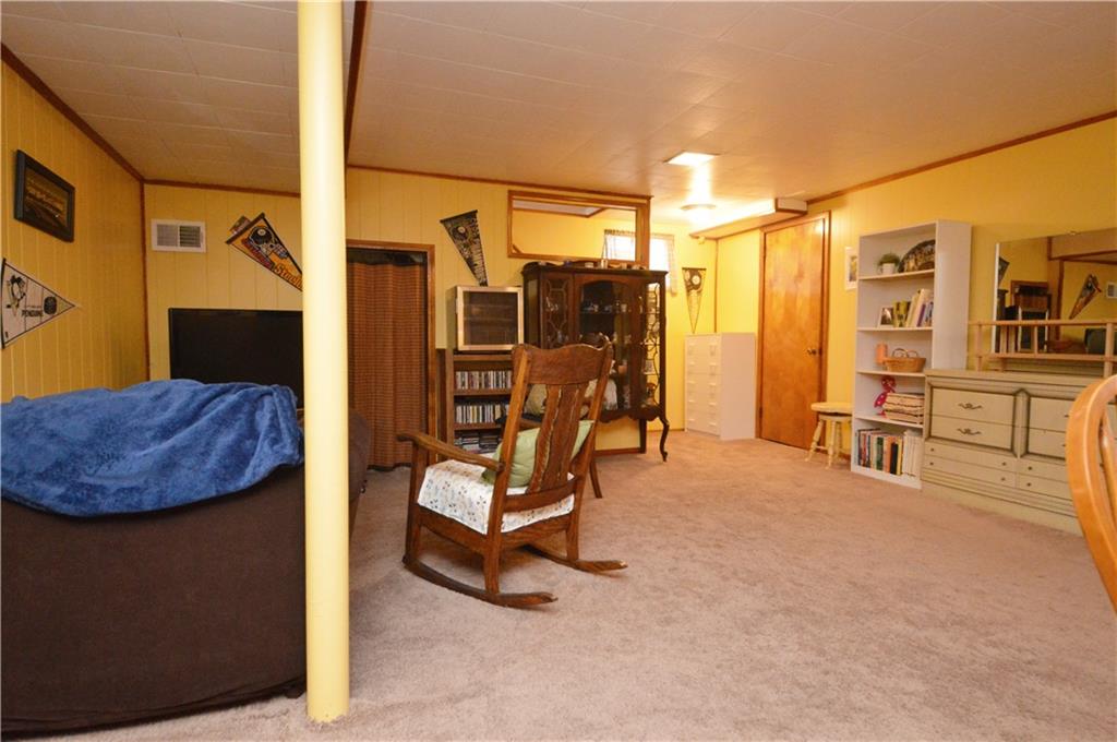 109 Thorncrest Drive McKees Rocks, PA 15136 - Photo 28 of 37 a view of a livingroom with furniture and a ceiling fan