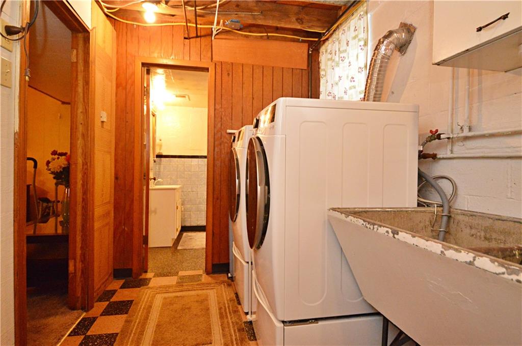 109 Thorncrest Drive McKees Rocks, PA 15136 - Photo 30 of 37 a view of a bathroom with a tub and a sink