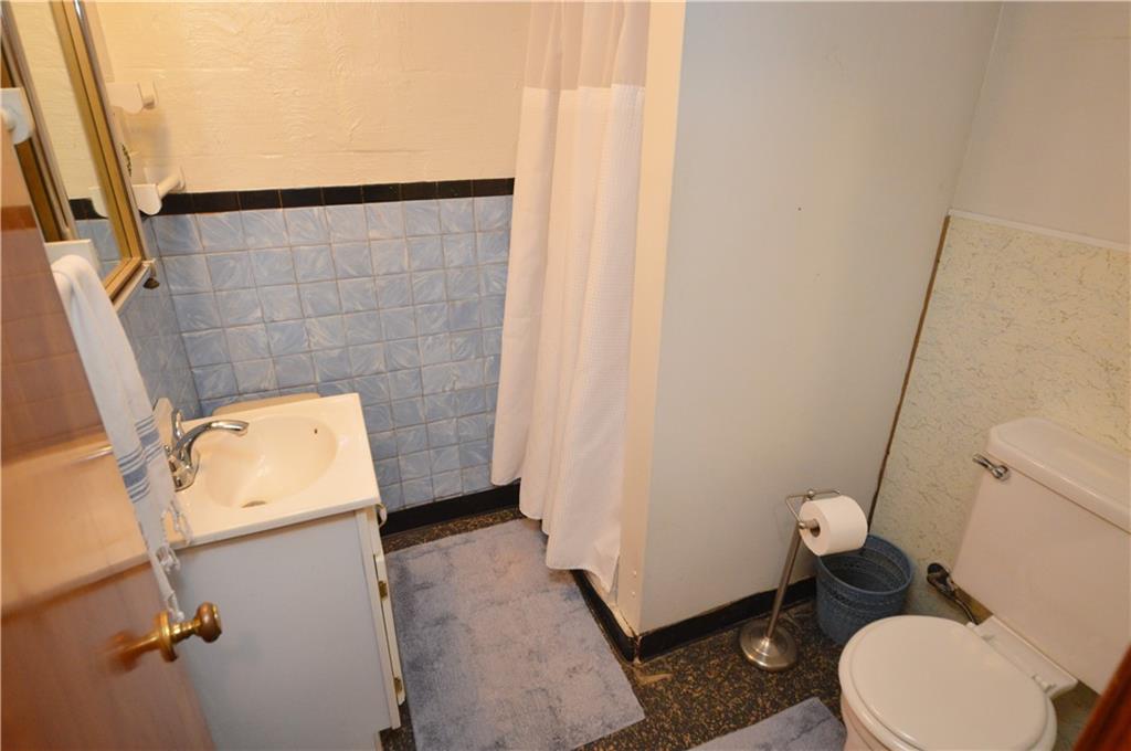 109 Thorncrest Drive McKees Rocks, PA 15136 - Photo 31 of 37 a bathroom with a sink and toilet