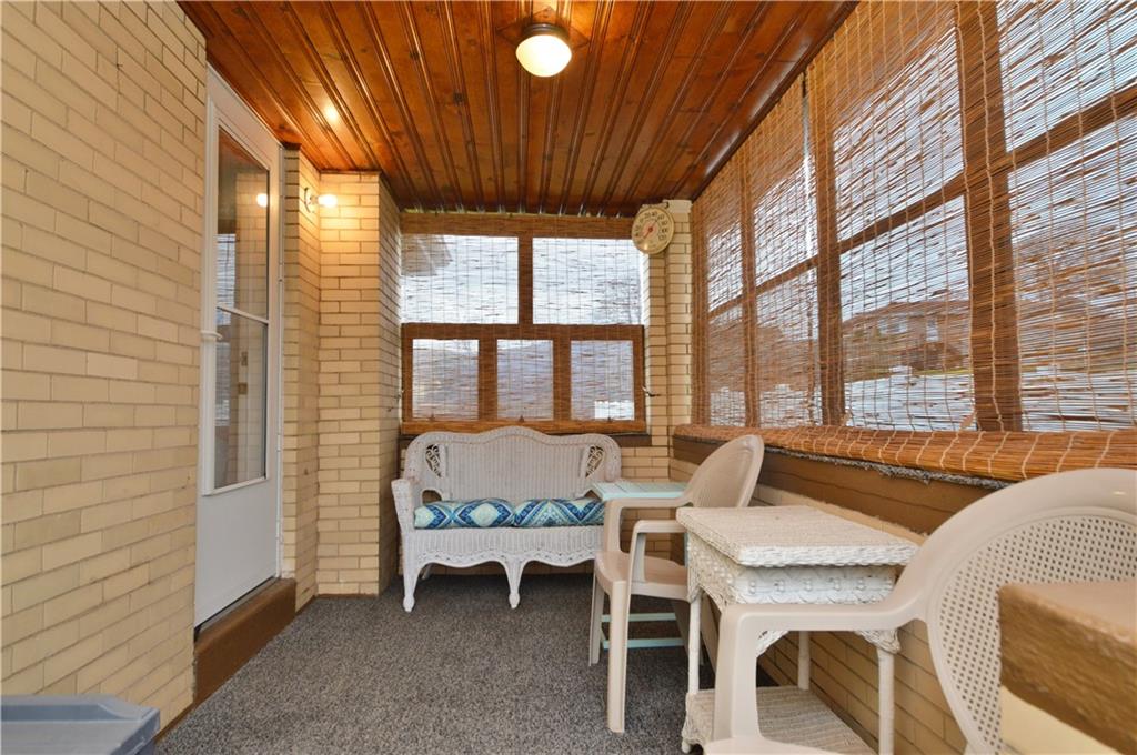 109 Thorncrest Drive McKees Rocks, PA 15136 - Photo 34 of 37 a dining room with furniture and a floor to ceiling window