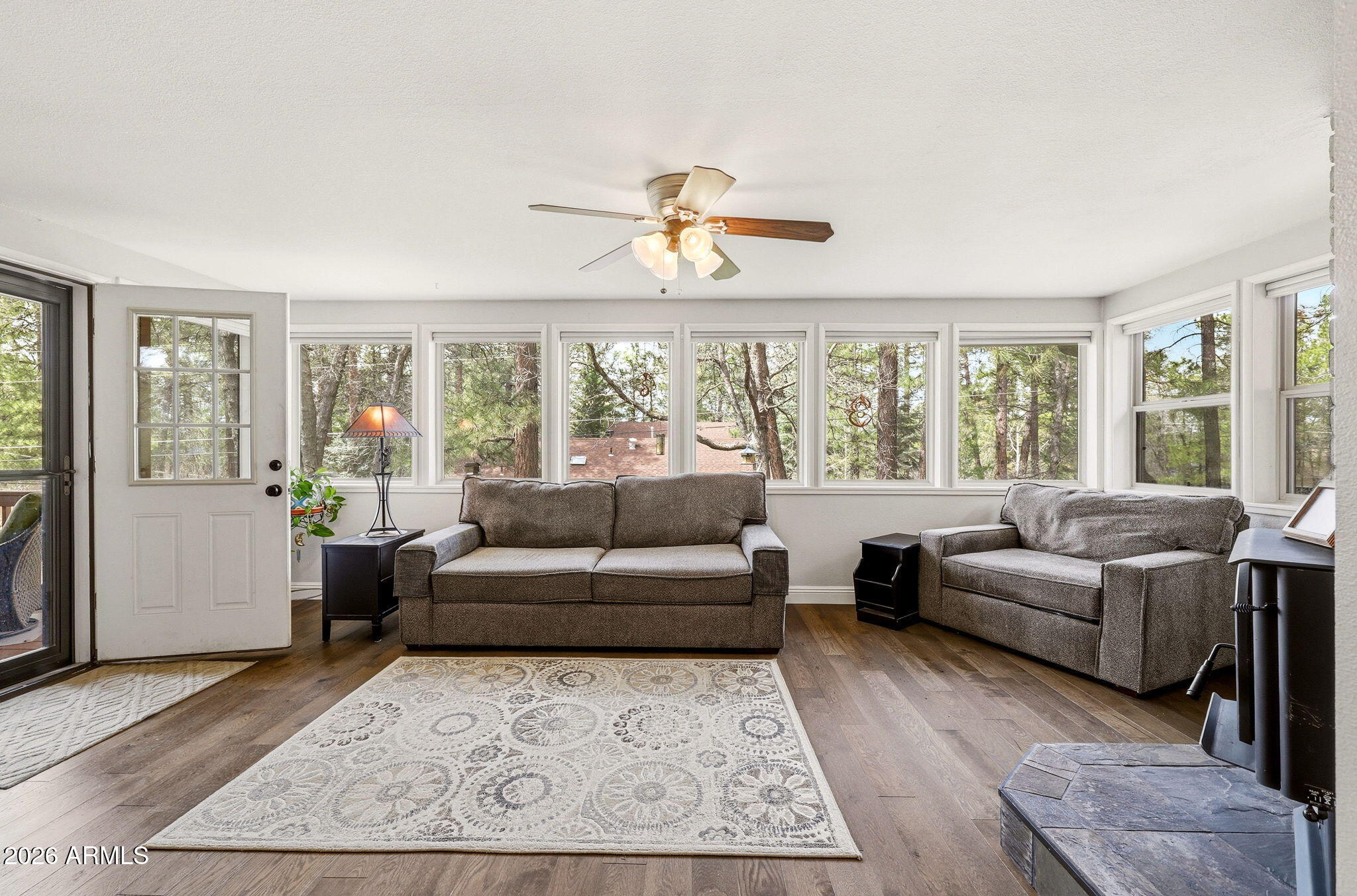 233 East Turkey Track Lane Pinetop, AZ 85935 - Photo 14 of 59 a living room with furniture and a large window