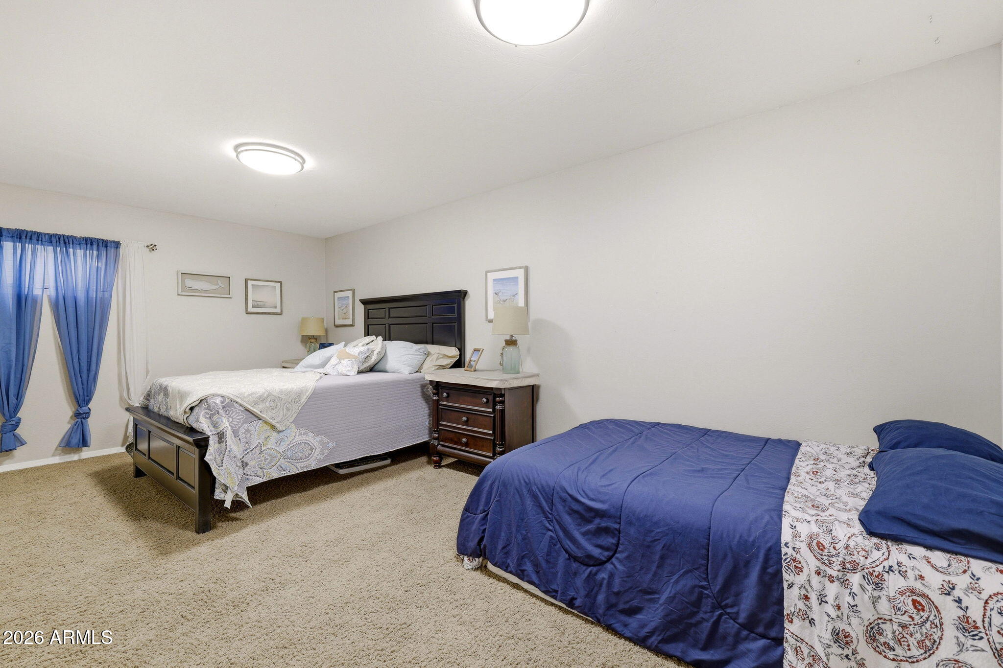 233 East Turkey Track Lane Pinetop, AZ 85935 - Photo 30 of 59 a bedroom with a bed and a closet