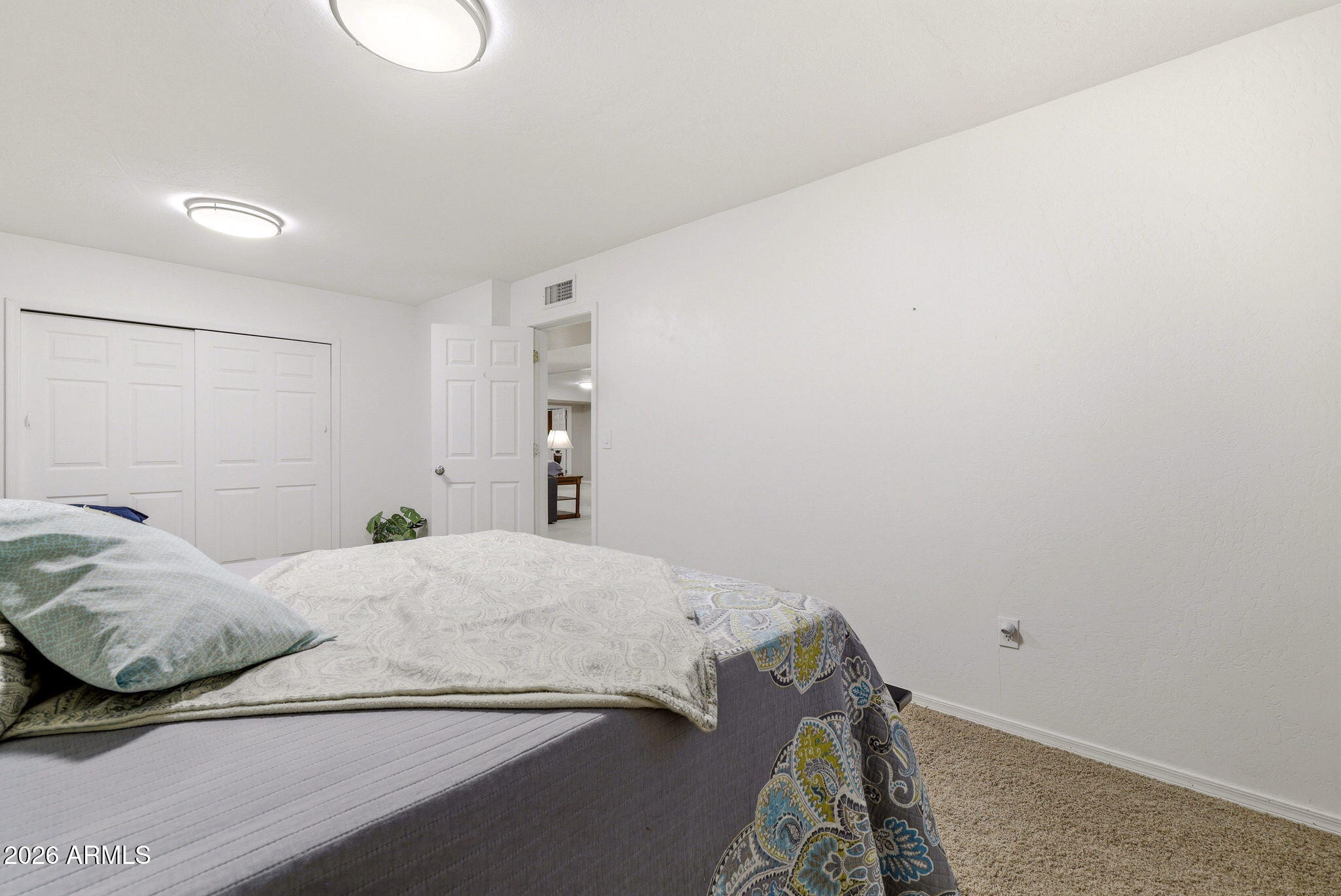 233 East Turkey Track Lane Pinetop, AZ 85935 - Photo 31 of 59 a bedroom with a bed and a window