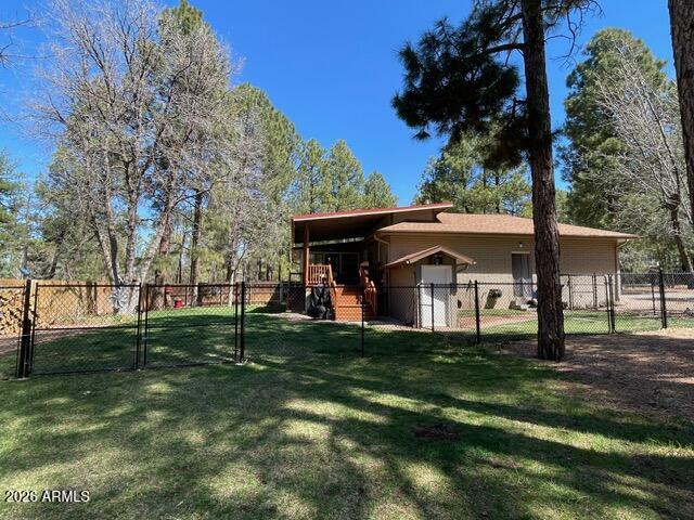 233 East Turkey Track Lane Pinetop, AZ 85935 - Photo 44 of 59 a view of a big house with a big yard and large trees