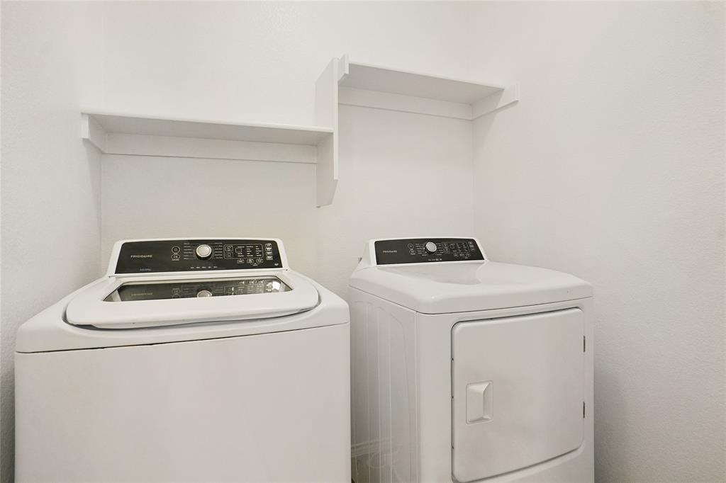 3752 Jade Street Fort Worth, TX 76244 - Photo 29 of 34 a utility room with dryer and washer