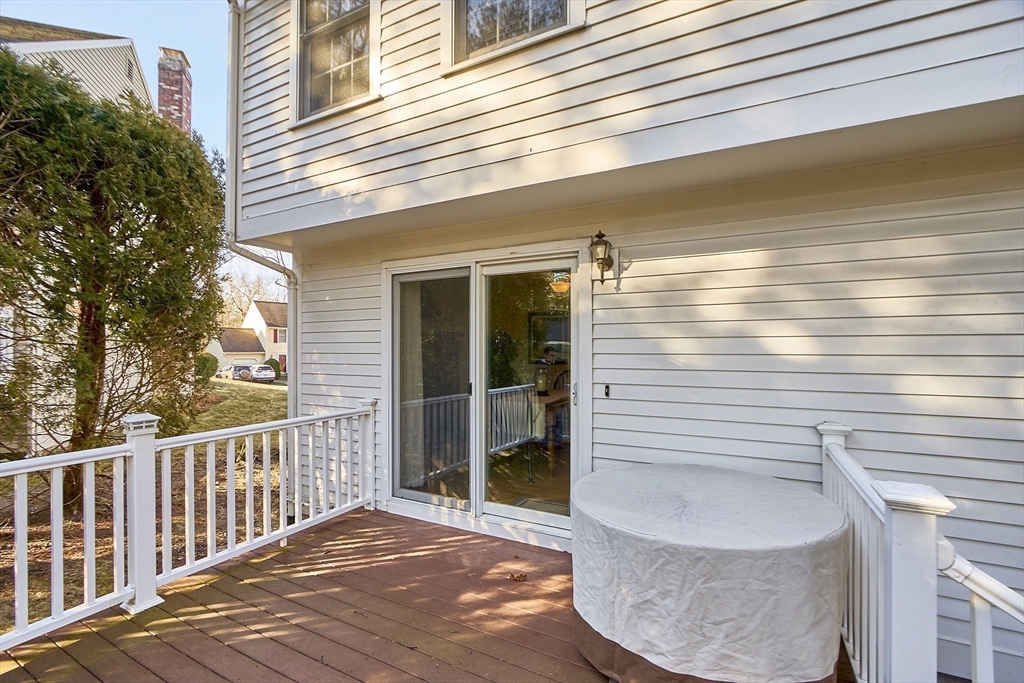 92 Stonegate Road, Unit 92 Chelmsford, MA 01824 - Photo 25 of 32 a view of a house with a balcony