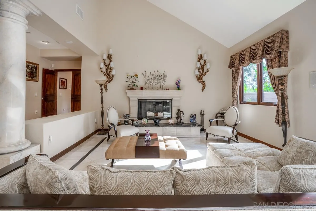 16072 Cross Fox Court Poway, CA 92064 - Photo 12 of 70 a living room with furniture and a fireplace